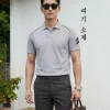 Áo Polo Nam Phối Viền Vai Họa Tiết Mũi Tên DOCAS Vải Cotton CMC Phom Regular Fit PL07